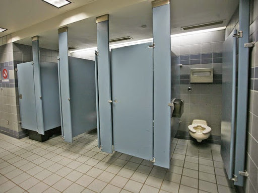 reason behind the doors of public toilets does not reach the floor