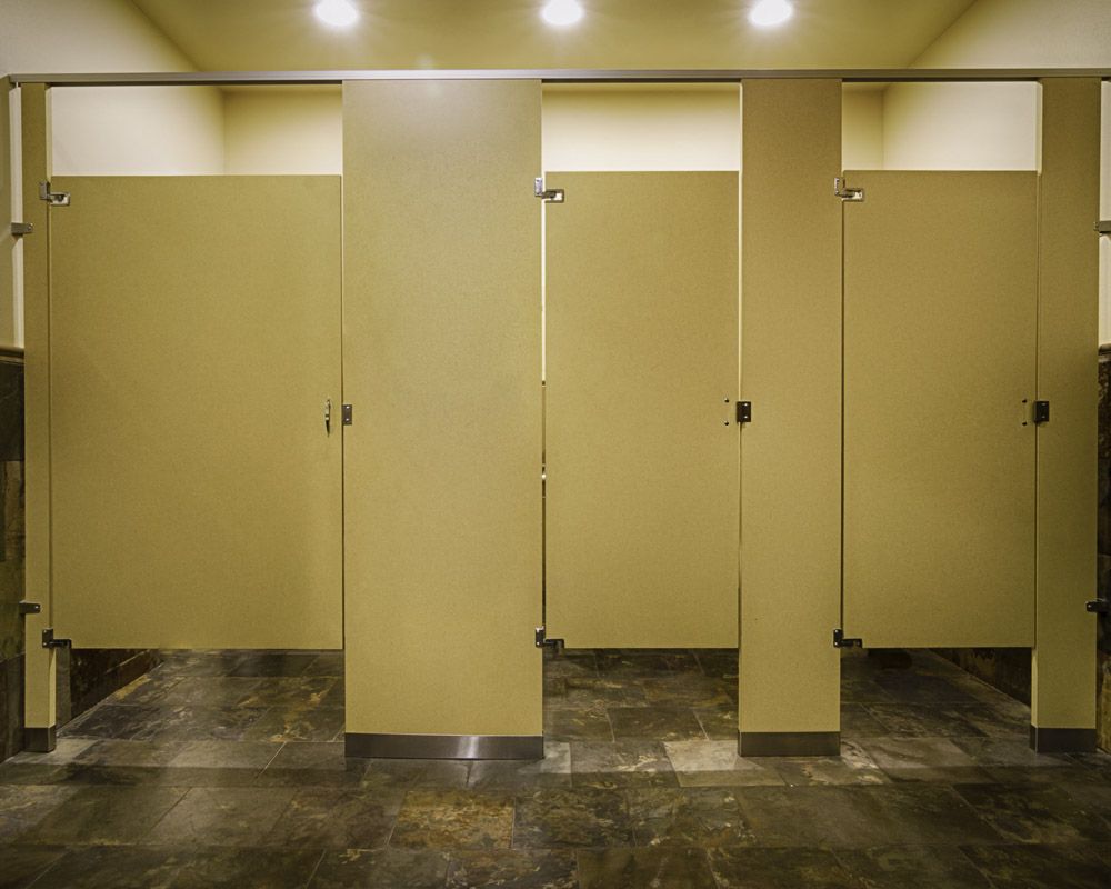 reason behind the doors of public toilets does not reach the floor