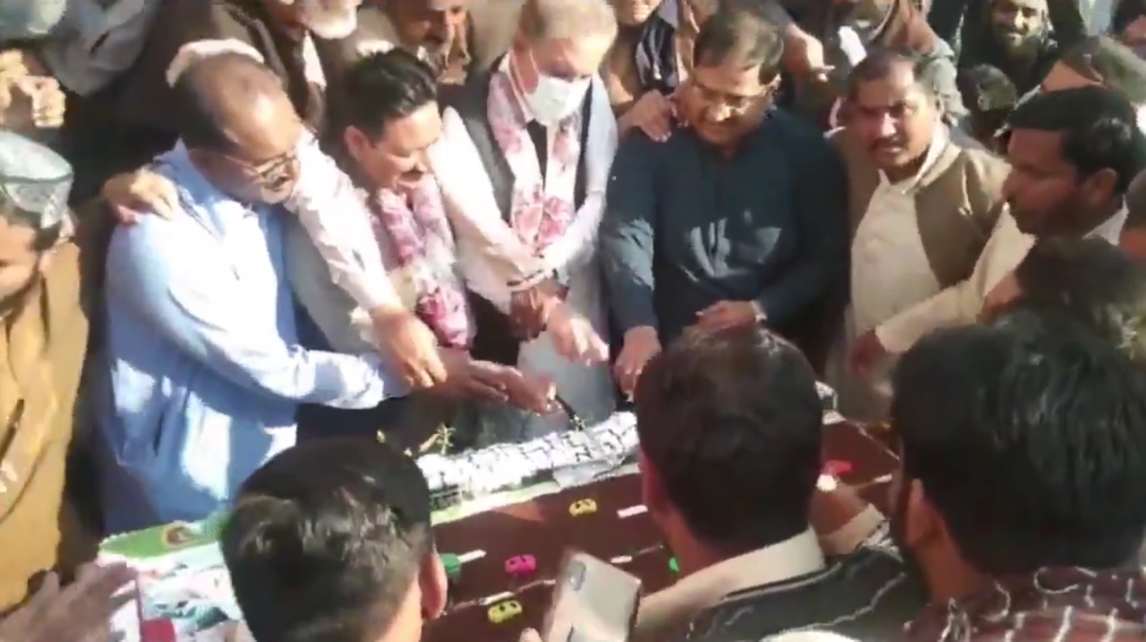 fighting for cake in Pakistan