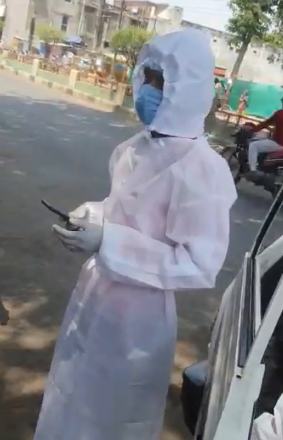 covid health worker stopped to drink sugar cane juice