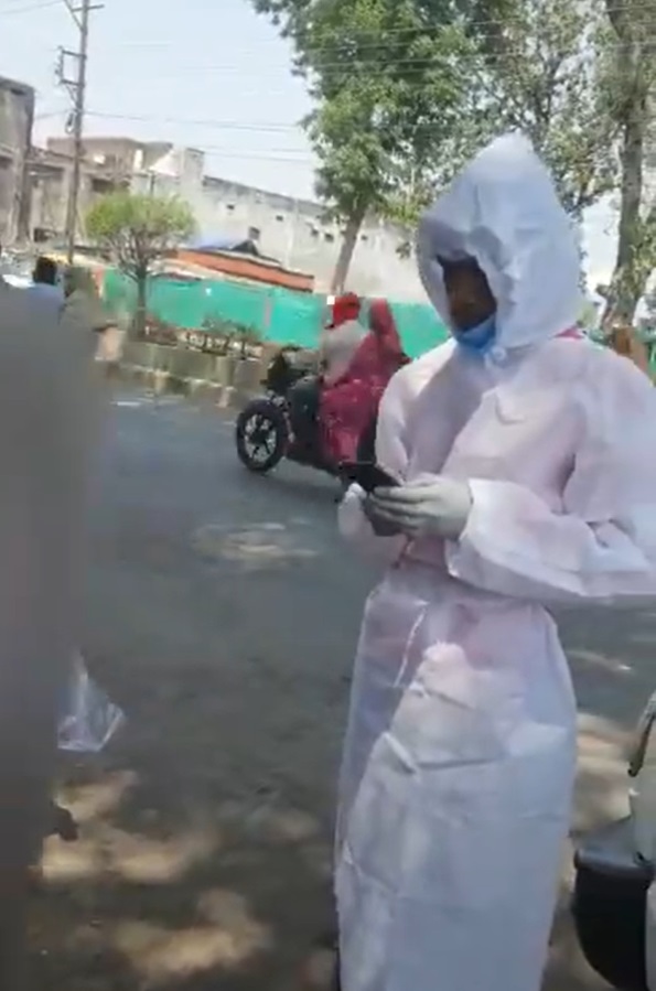 covid health worker stopped to drink sugar cane juice