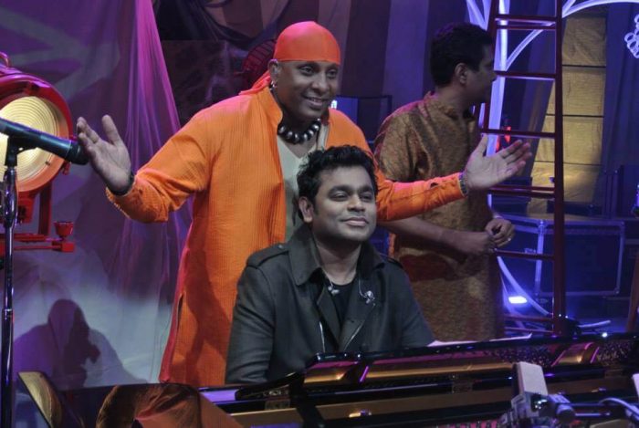 why does drums sivamani covers his head