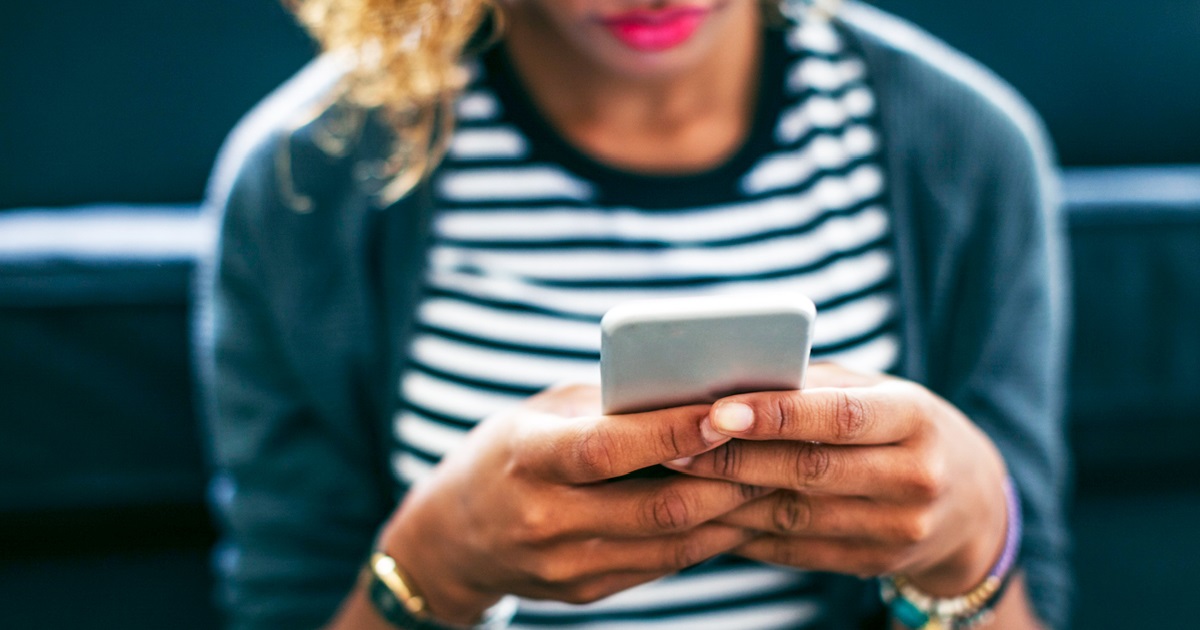 women checking phone