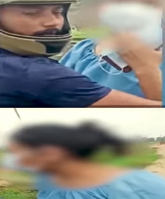 Couple kissing on a running bike in Bihar