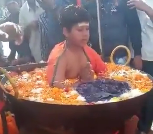 video of a boy sitting in boiling water goes viral