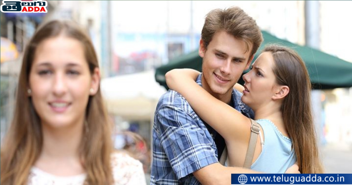 Man looks another girl in front of wife