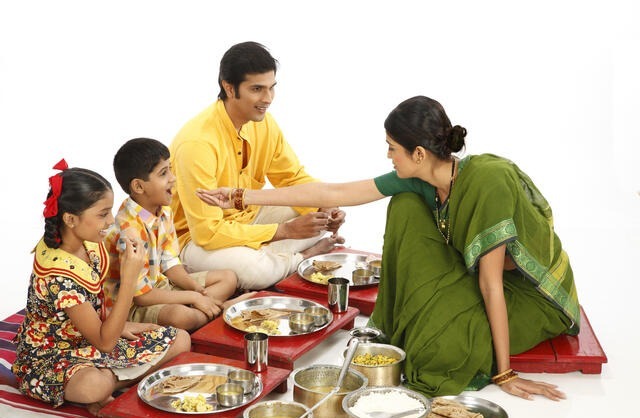 why do women in households eat at last