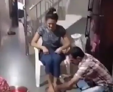 parents wash daughters feet with milk and drink it